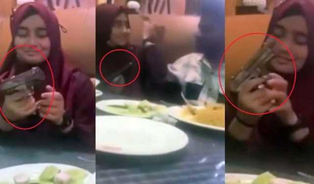 প্রেমিকাকে পিস্তল চালানো শেখানোর ভিডিও ভাইরাল