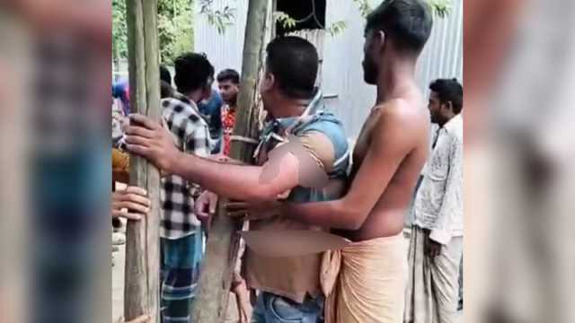 চুরির অপবাদে ব্যবসায়ীকে গাছে বেঁধে পেটালেন মহাজন